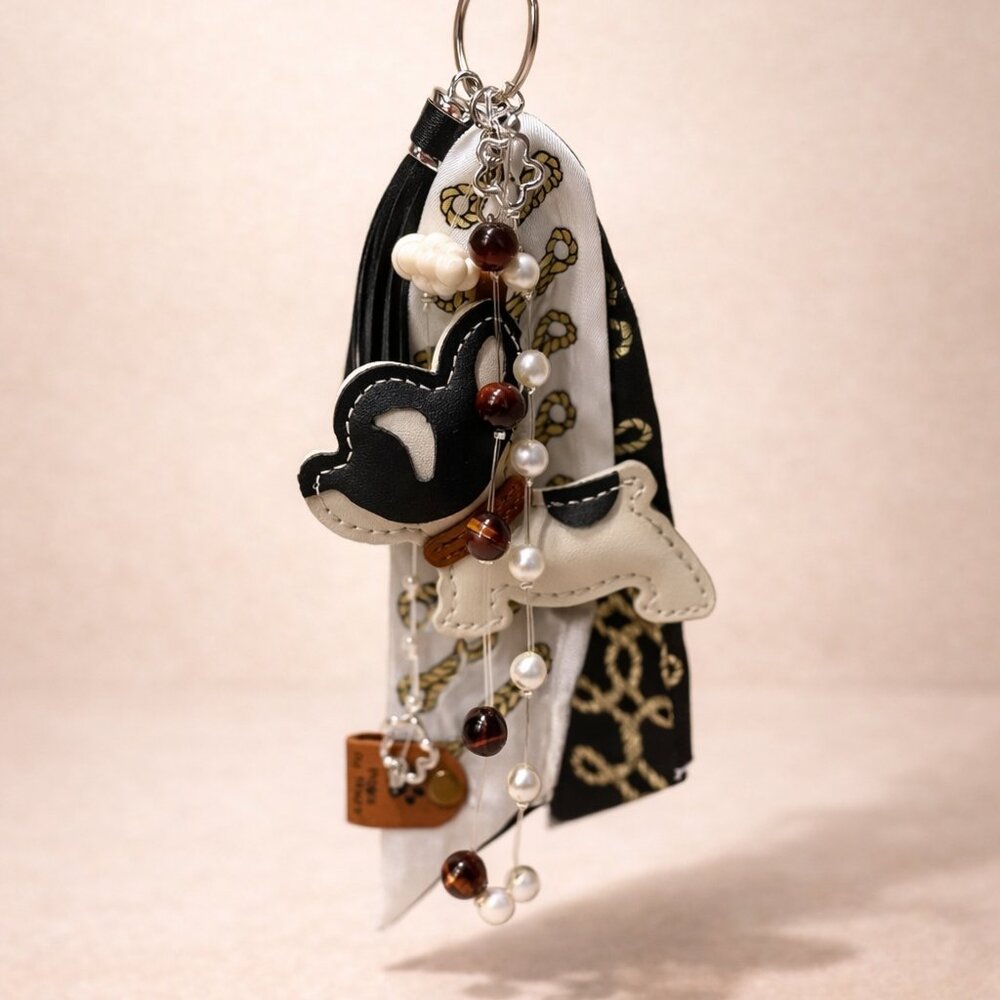 Dog Charm Keychain – Black & White Pup with Tassel & Pearl Beads